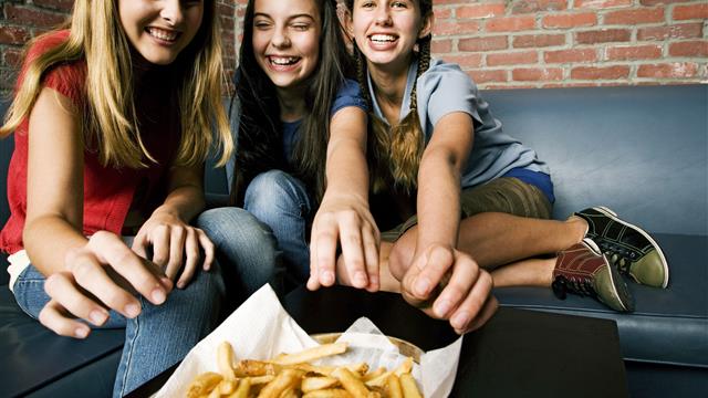 Teens Eating Fries at Bowling Alley.jpg