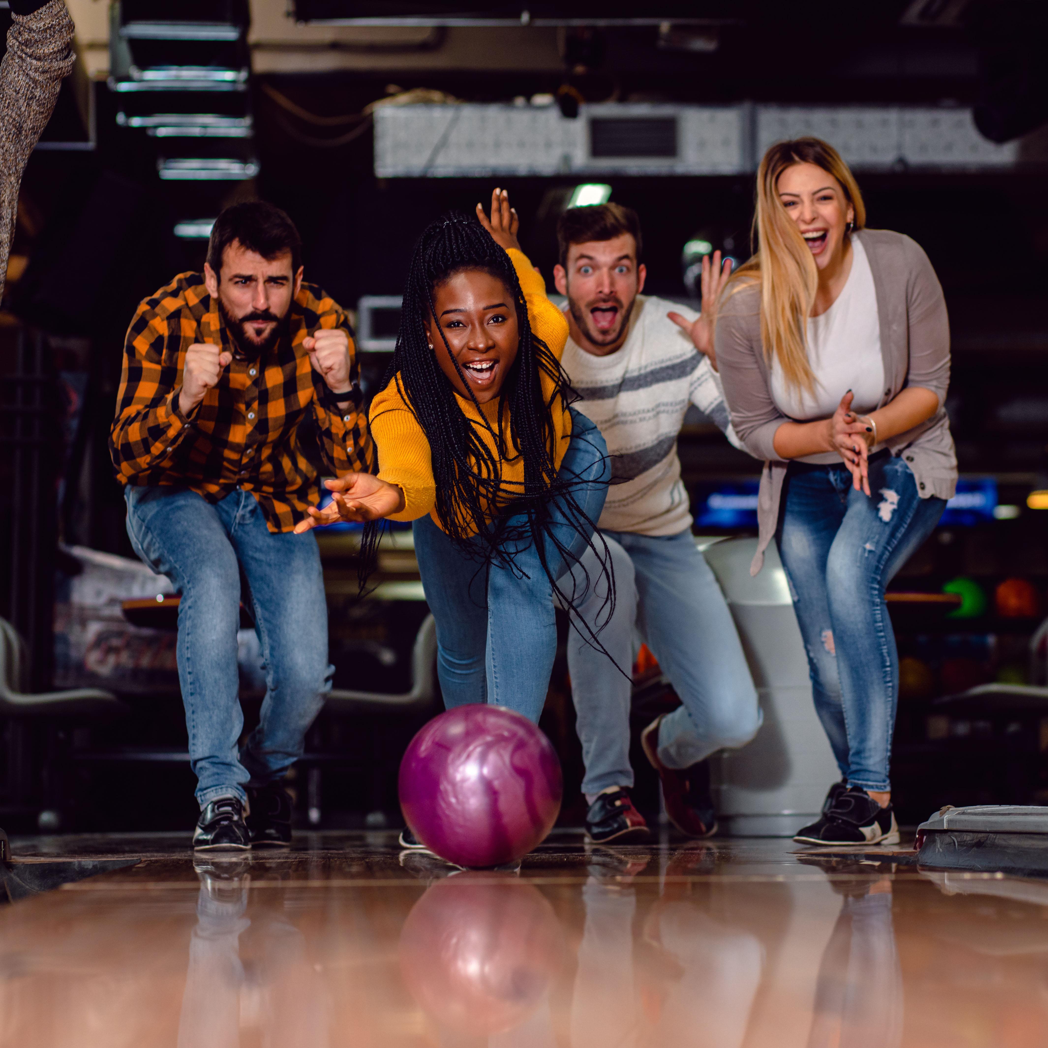 Group of People Bowling